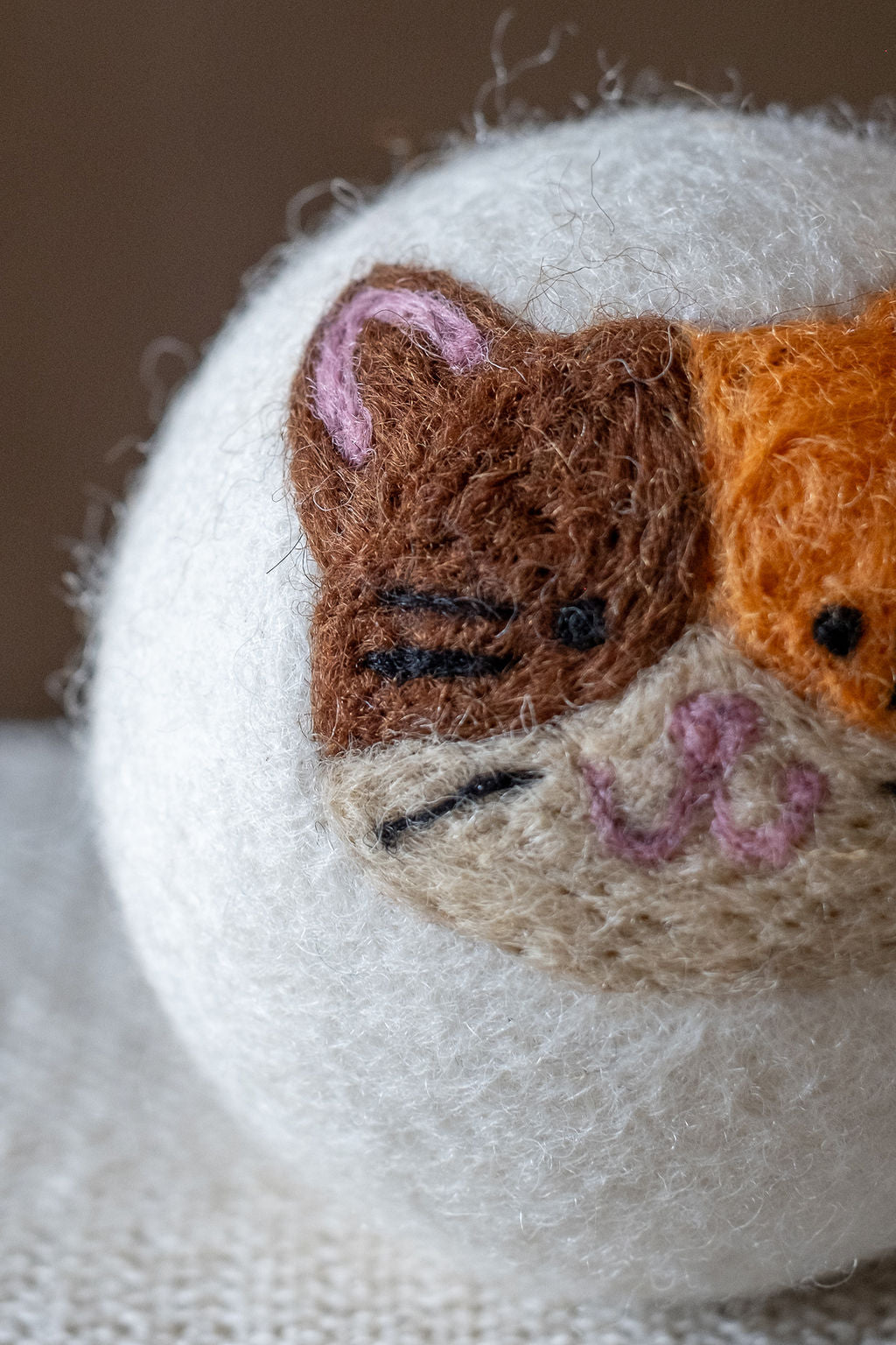 Calico wool dryer ball, detail photo