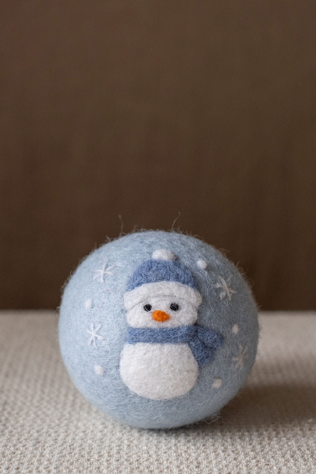 Snowman set wool dryer ball, in use photo