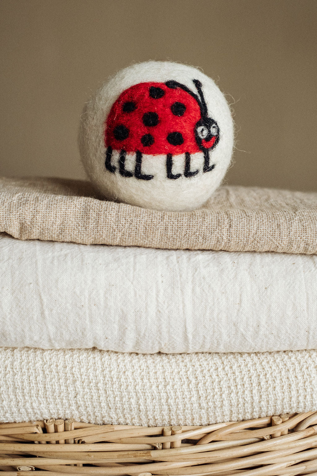 Lady Bug with Legs wool dryer ball, in use photo
