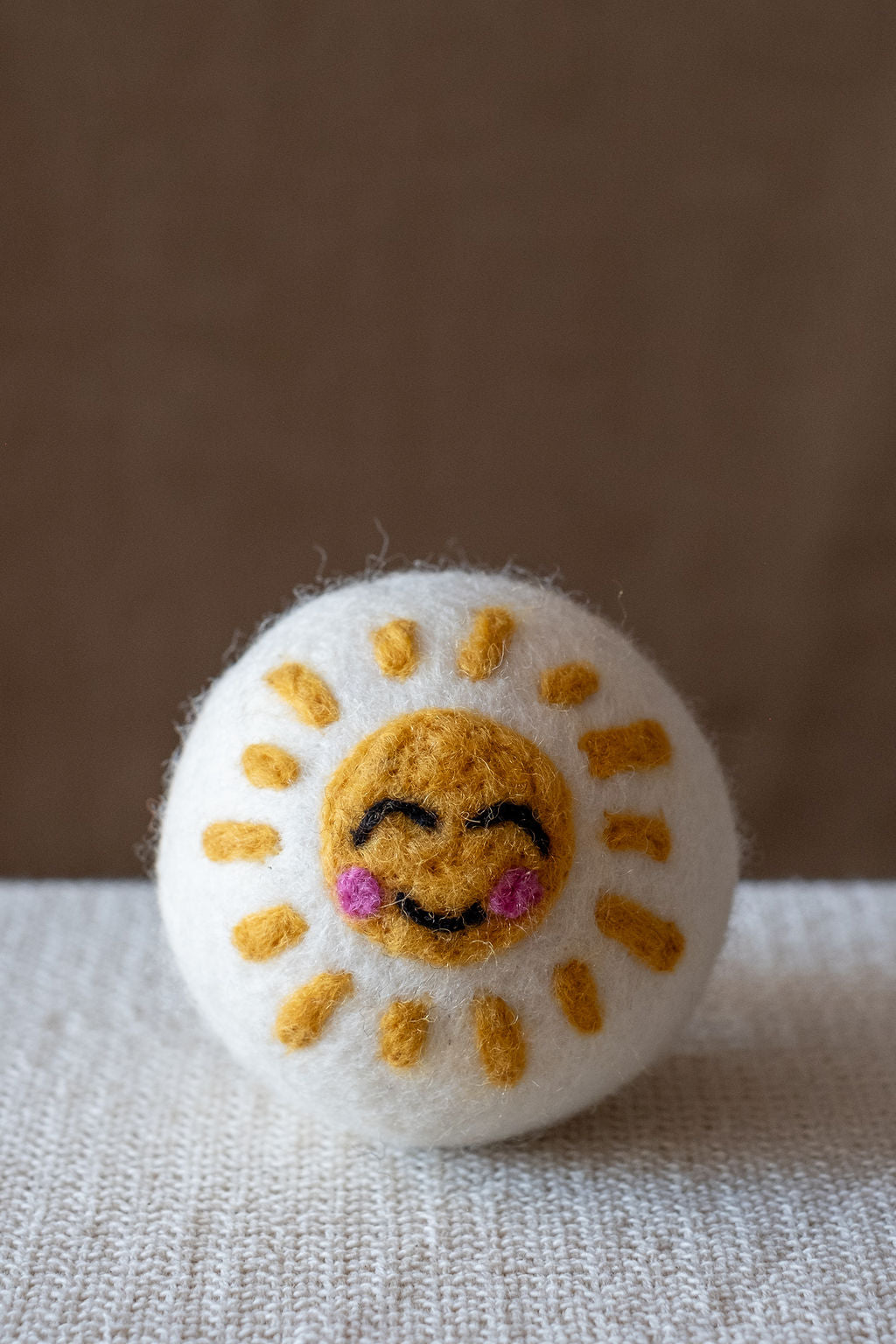 Sun wool dryer ball, studio photo