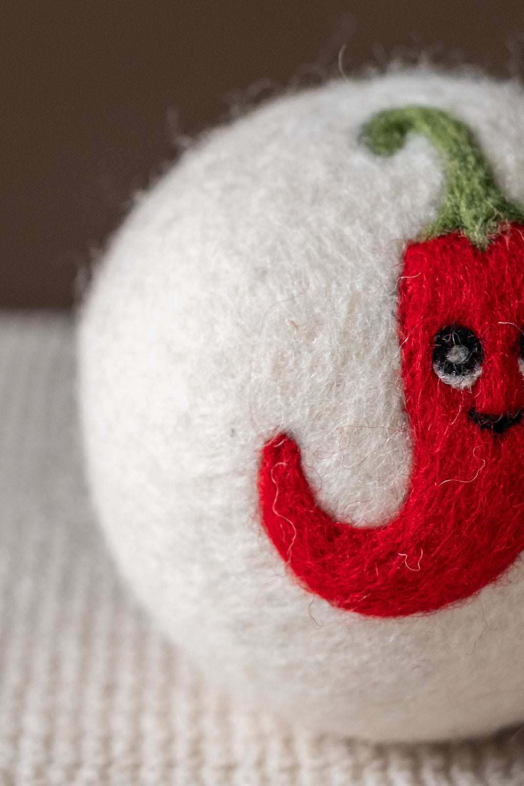 Red Pepper wool dryer ball, detail photo