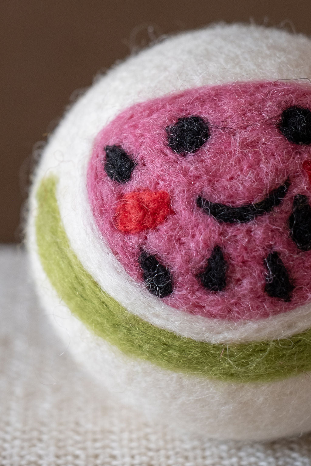 Watermelon wool dryer ball, detail photo