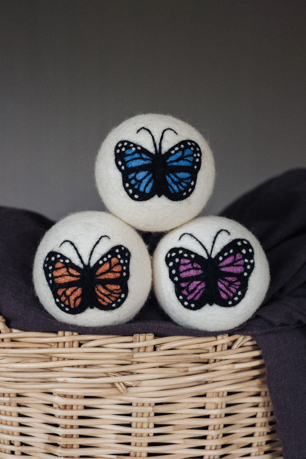 Purple Butterfly wool dryer ball, in use photo