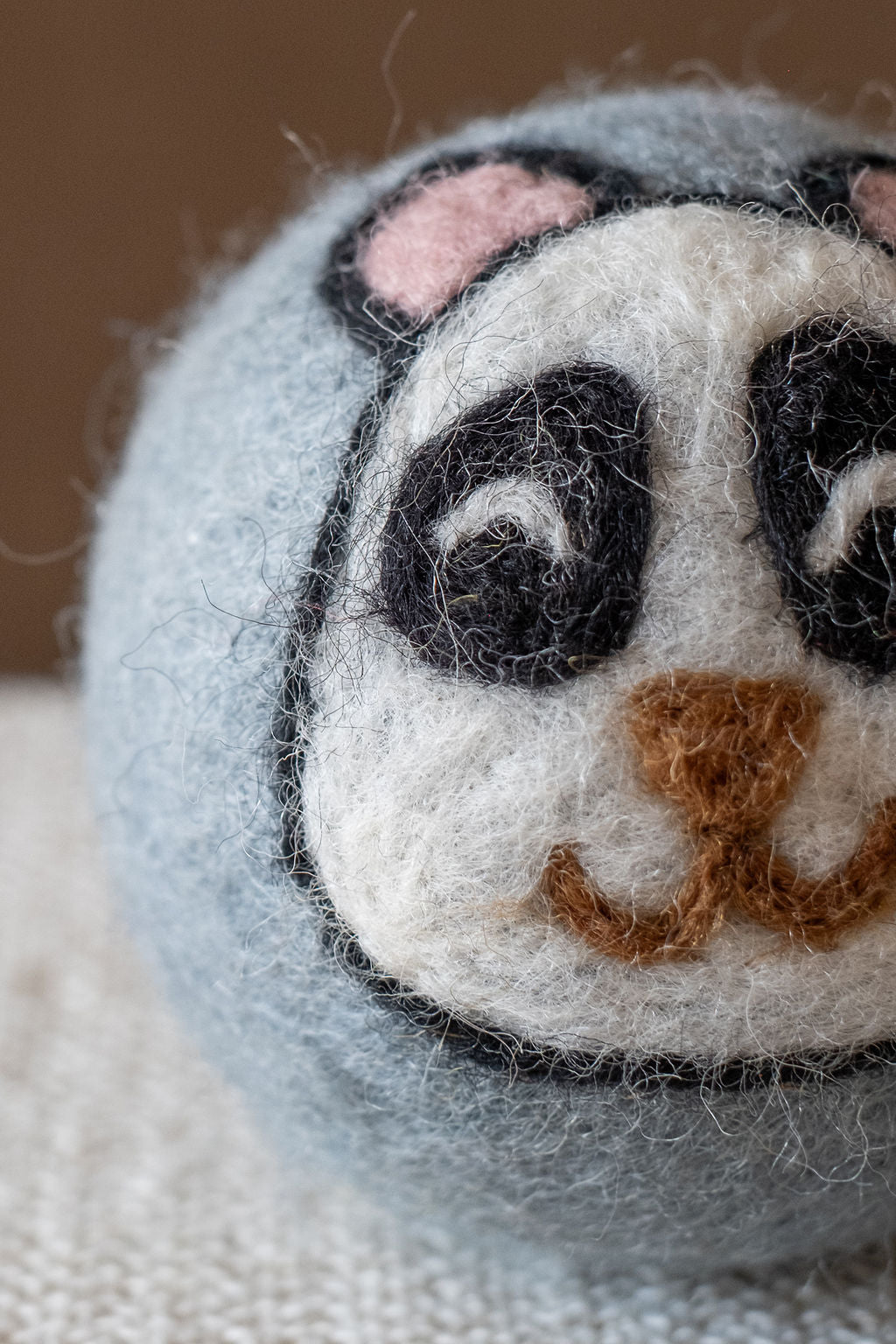 Panda wool dryer ball, detail photo