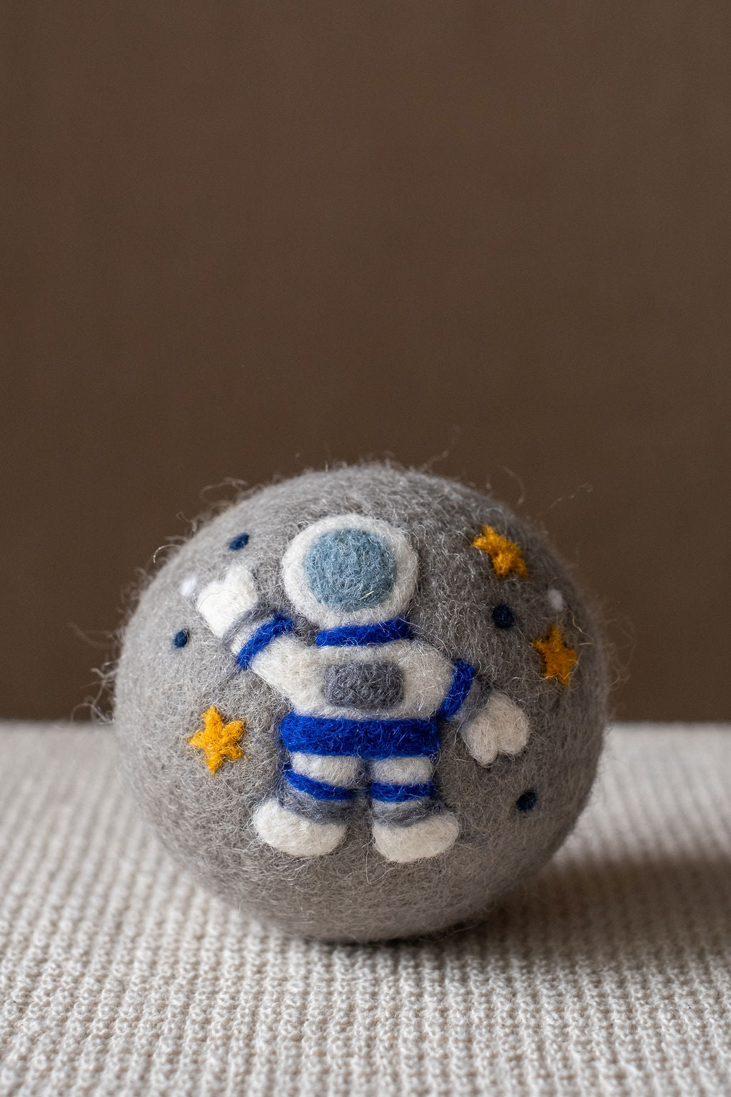 Space set wool dryer ball, in use photo