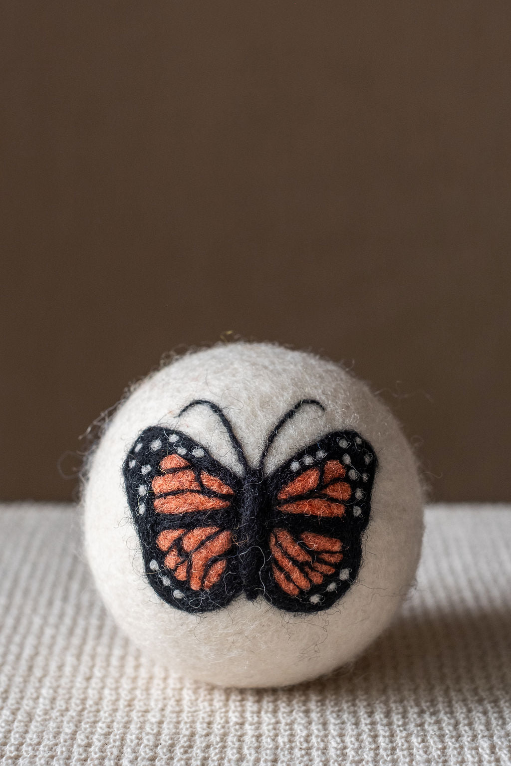 Butterflies set wool dryer ball, in use photo