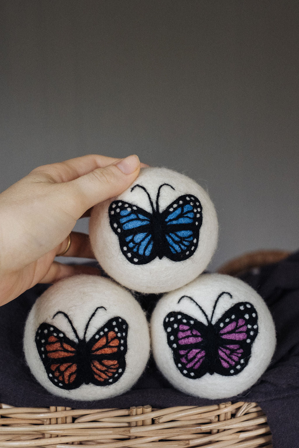 Blue Butterfly wool dryer ball, in use photo