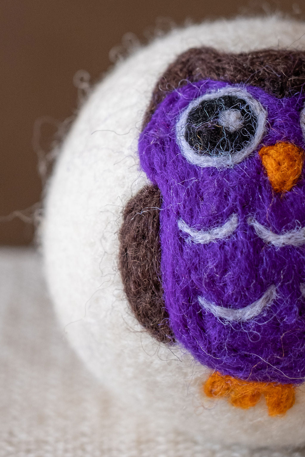 Purple Owl wool dryer ball, detail photo