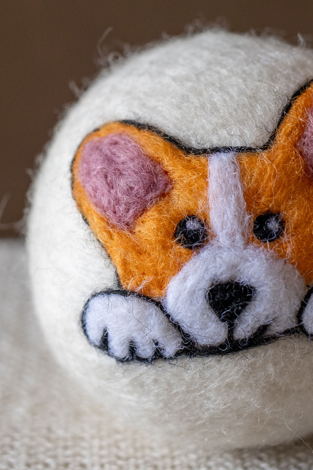 Corgi wool dryer ball, detail photo