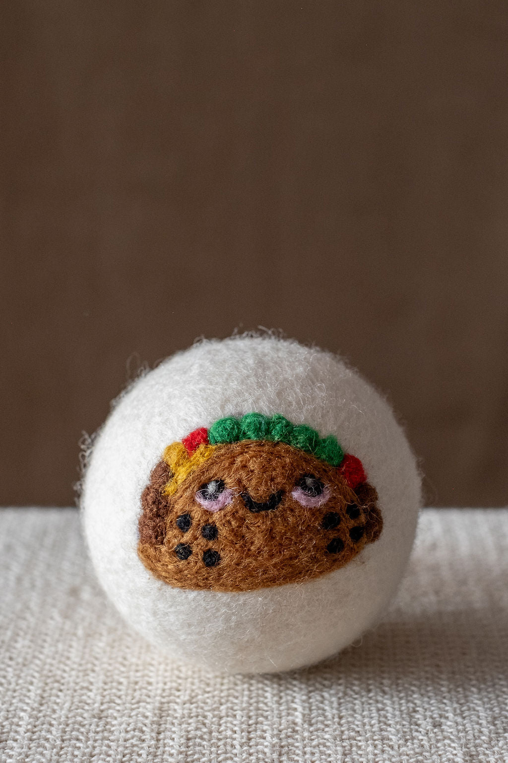 Taco wool dryer ball, studio photo