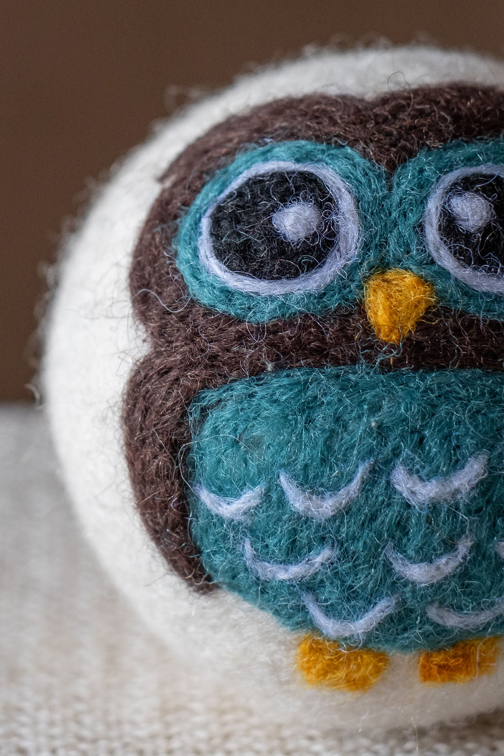 Blue Owl wool dryer ball, detail photo