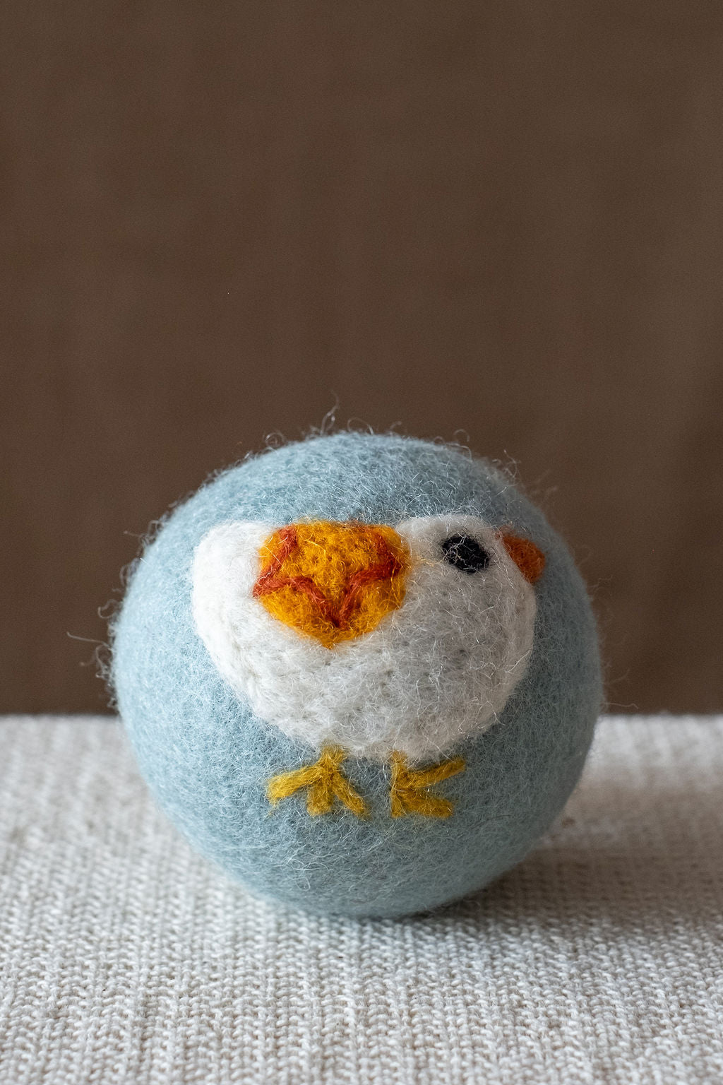 White Bird wool dryer ball, studio photo