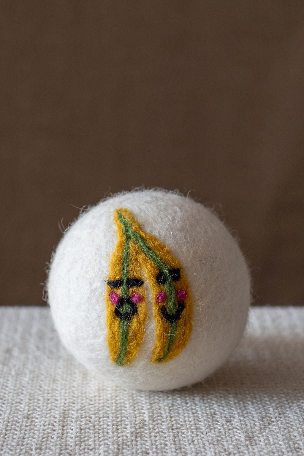 Bananas wool dryer ball, studio photo