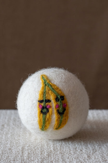 Bananas wool dryer ball, studio photo