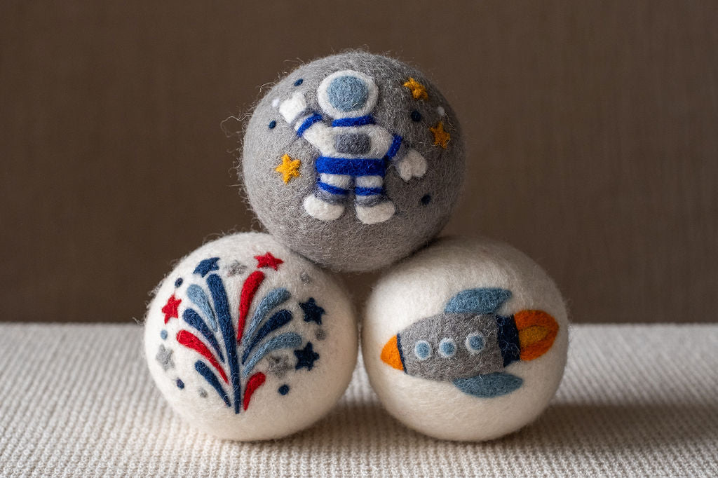 Space set wool dryer ball, studio photo