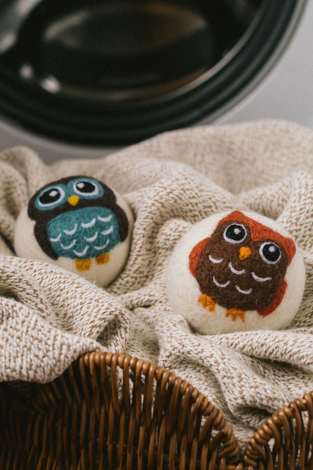 Blue Owl wool dryer ball, in use photo