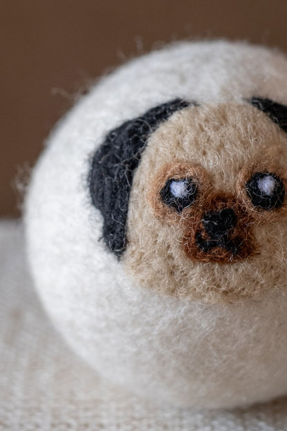 Pug wool dryer ball, detail photo