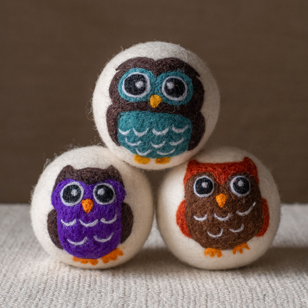 Owls set wool dryer ball, studio photo