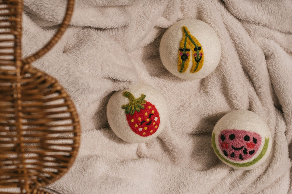 Watermelon wool dryer ball, in use photo