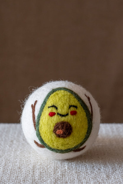 Avocado wool dryer ball, studio photo