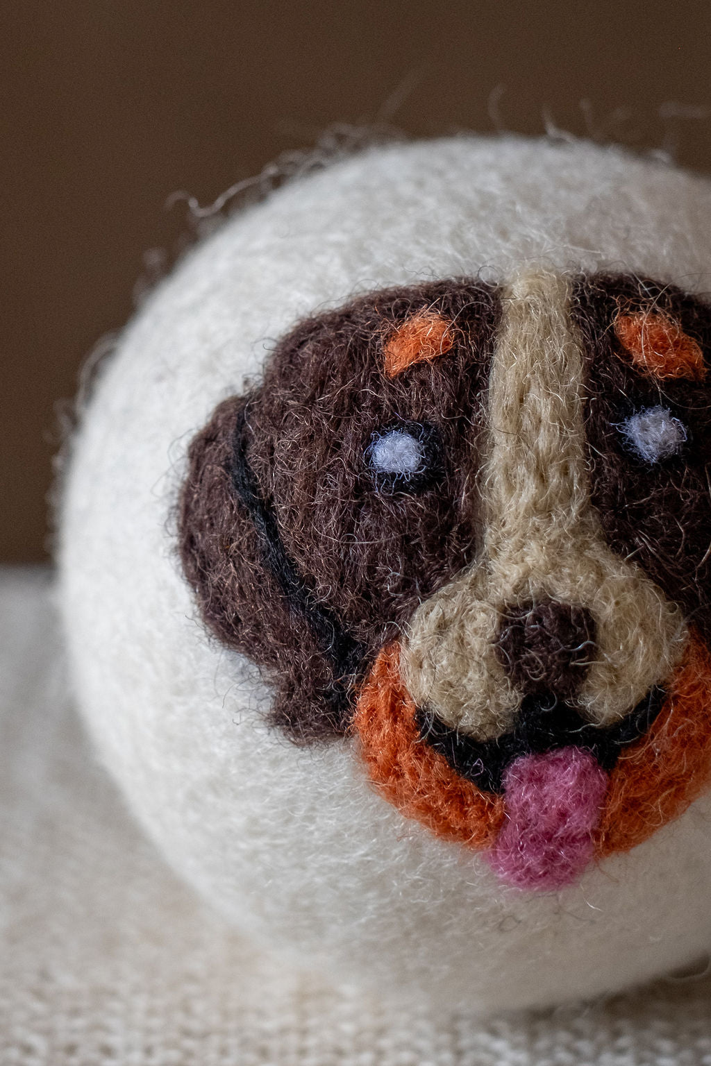 Brown Dog wool dryer ball, detail photo