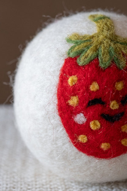 Strawberry wool dryer ball, detail photo