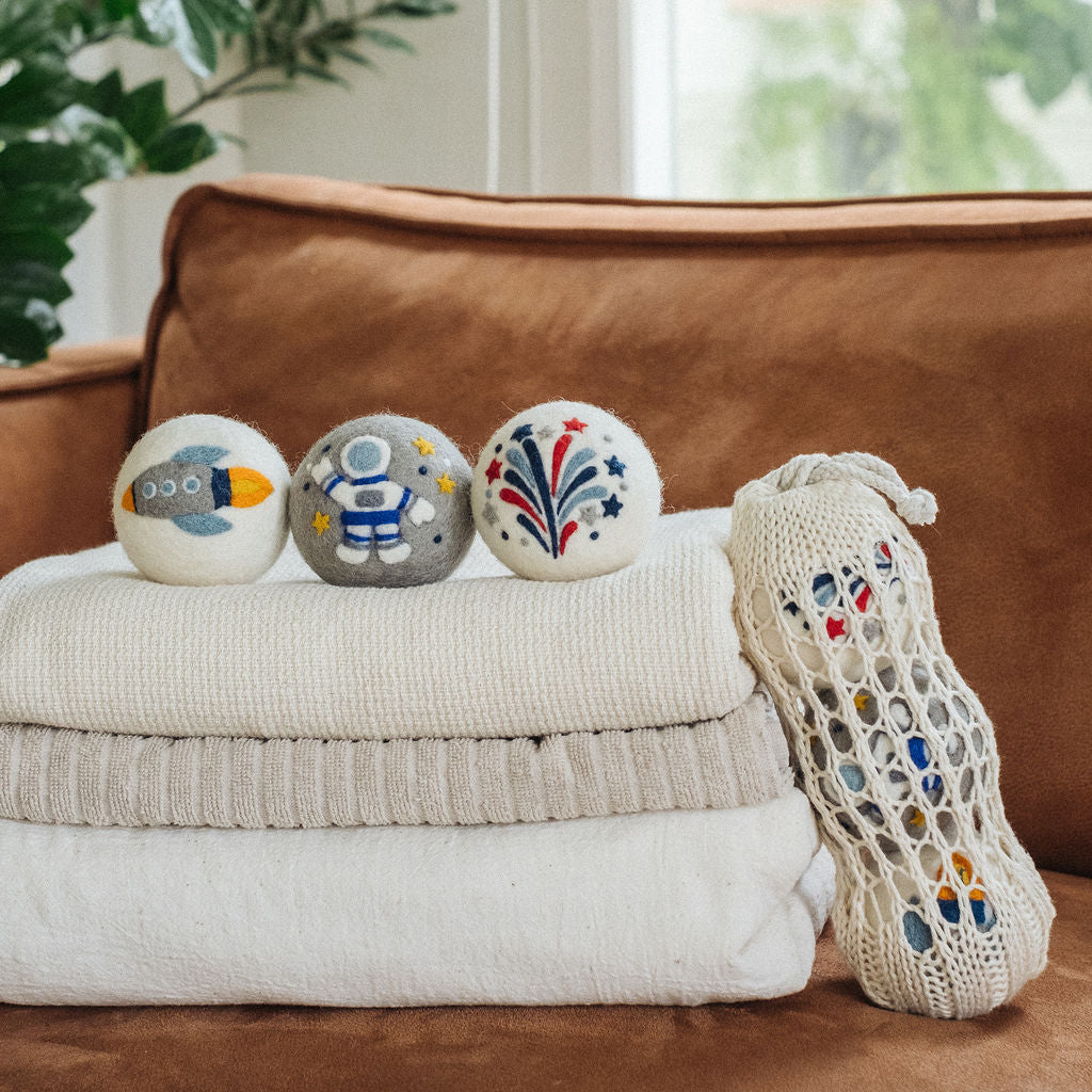 The Space set on a stack of folded towels